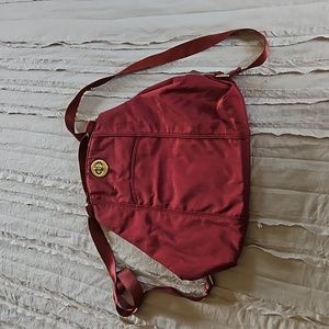 Baggallini Convertible shoulder bag to backpack in dark red NEW